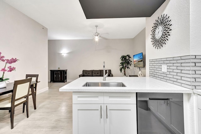 2801 Riverside Dr Unit 203-S, Coral Springs, FL 33065 - kitchen featuring a sink, a ceiling fan, light countertops, a peninsula, and stainless steel dishwasher