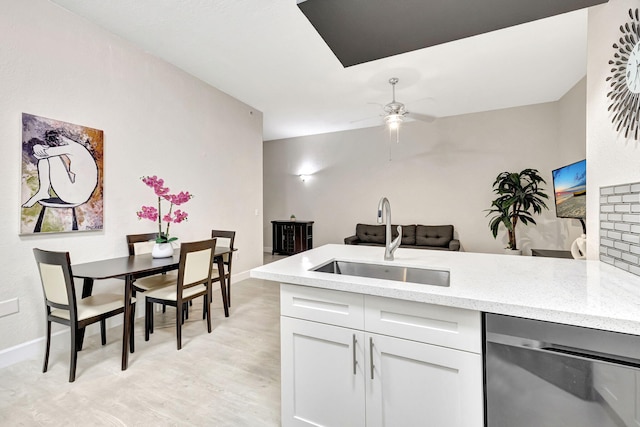 2801 Riverside Dr Unit 203-S, Coral Springs, FL 33065 - kitchen with a sink, dishwasher, a ceiling fan, and light stone countertops