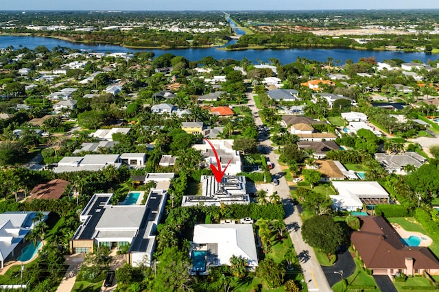 bird's eye view with a water view