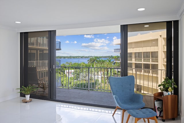 balcony featuring a water view