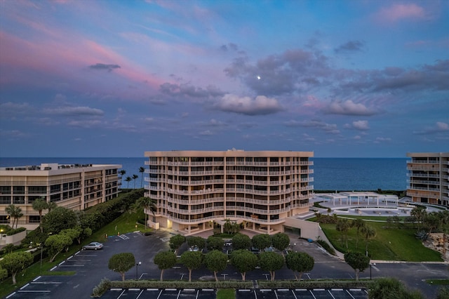 outdoor building at dusk with a water view