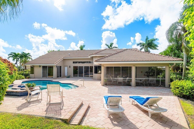 view of swimming pool with a patio area