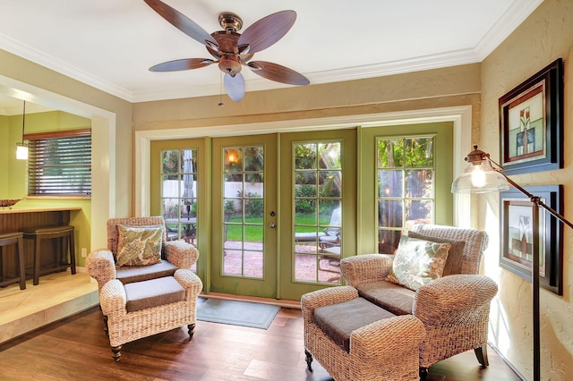 interior space with ceiling fan