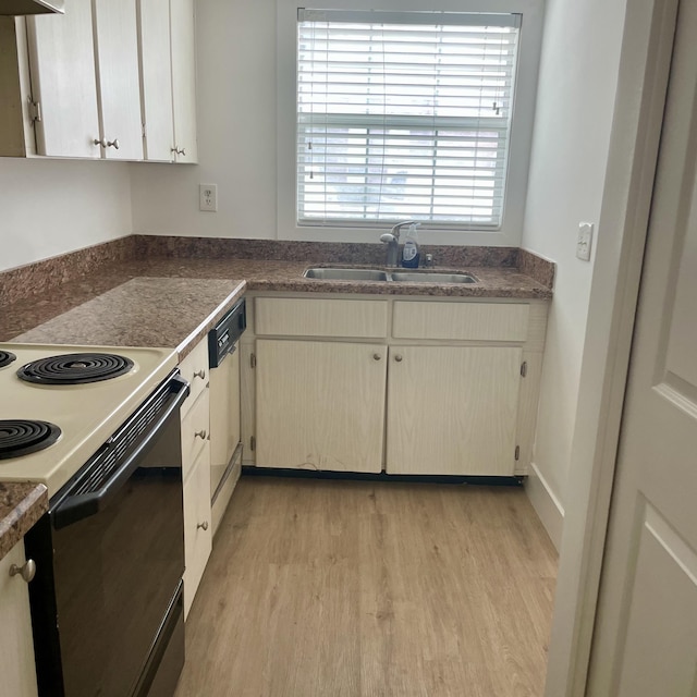 kitchen featuring dishwashing machine, light wood-type flooring, sink, and white electric range oven