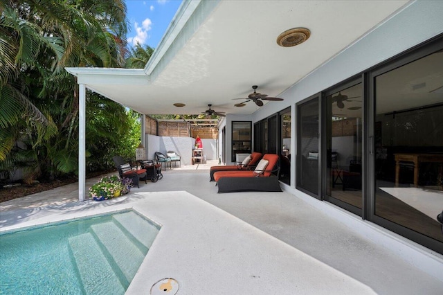 exterior space with ceiling fan