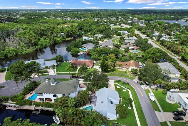 drone / aerial view with a water view