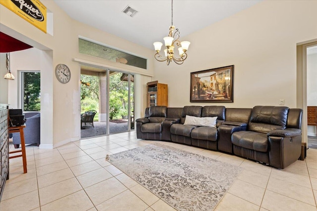 tiled living room with a high ceiling and a notable chandelier