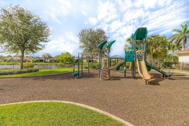 view of playground featuring a water view