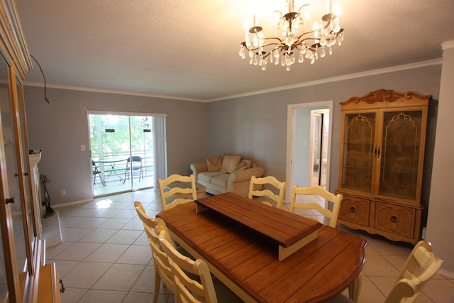 dining area featuring ornamental molding, a notable chandelier, and light tile patterned floors