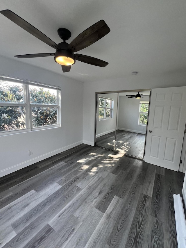 1010 Adams St, West Palm Beach, FL 33407 - spare room featuring a ceiling fan, wood finished floors, and baseboards
