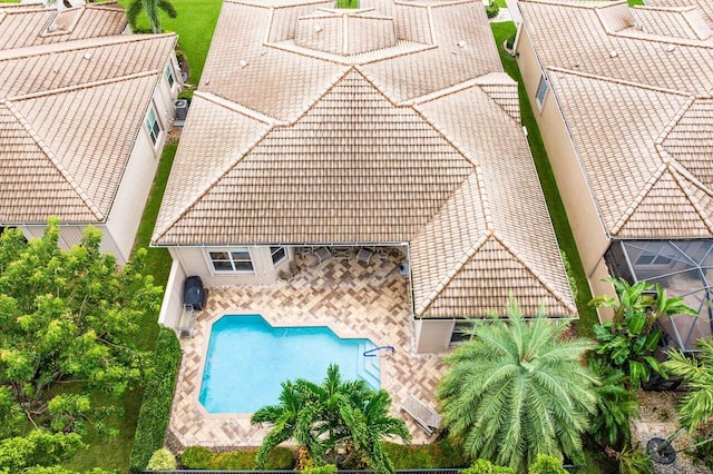 view of swimming pool with a patio area