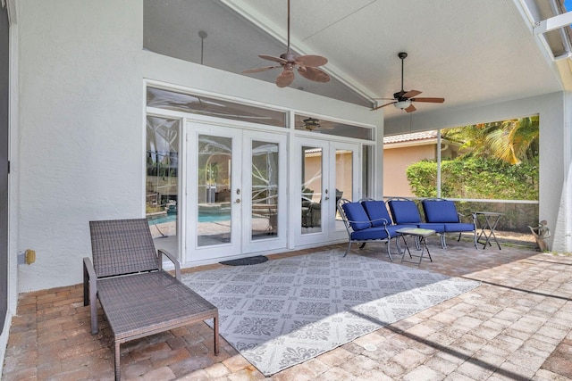 view of patio with french doors, an outdoor living space, and ceiling fan