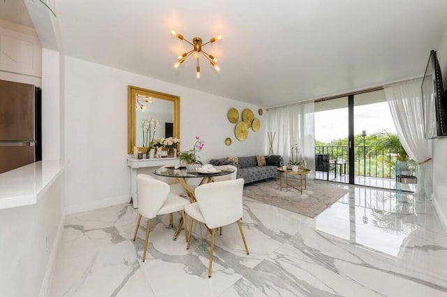 dining area with a notable chandelier