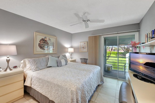 tiled bedroom featuring a textured ceiling, ceiling fan, and access to outside