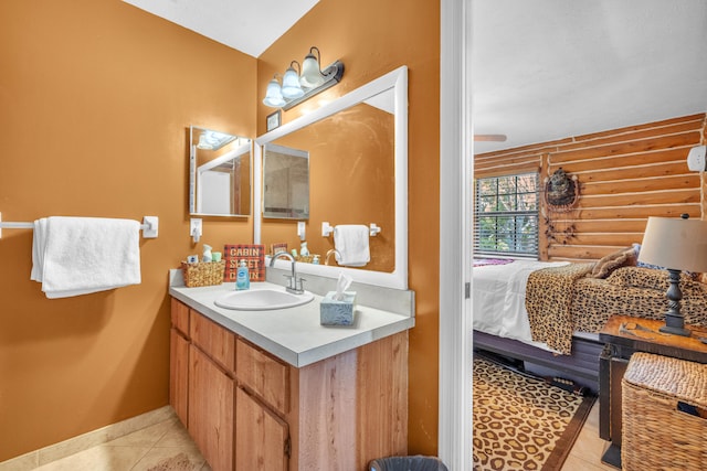 bathroom with vanity and tile patterned floors