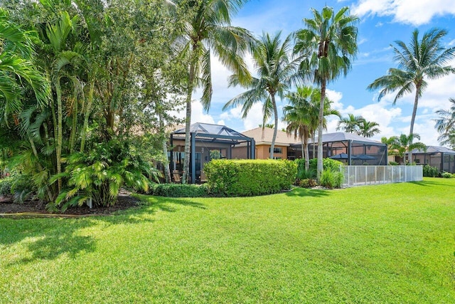 view of yard featuring a lanai