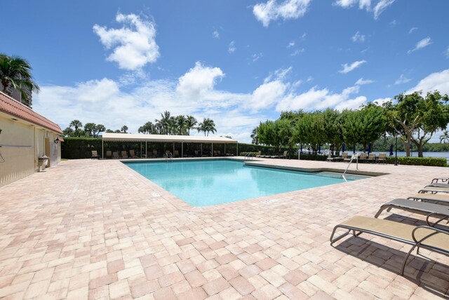 view of pool featuring a patio