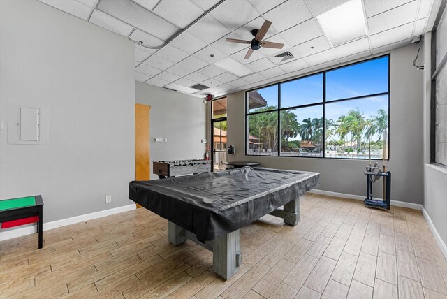 playroom with light hardwood / wood-style flooring, ceiling fan, pool table, and a drop ceiling