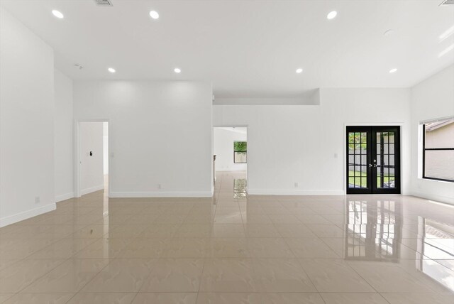 empty room featuring french doors