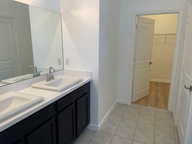 bathroom with vanity and hardwood / wood-style flooring