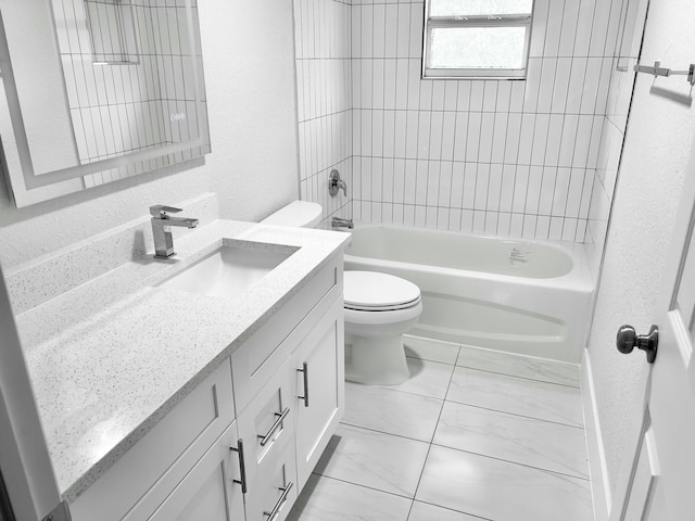 full bathroom featuring tiled shower / bath combo, vanity, and toilet