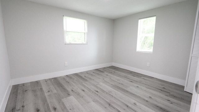 full bathroom with tile patterned flooring, vanity, tiled shower / bath, and toilet