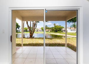 view of patio with a water view