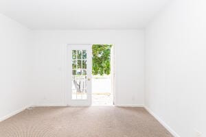 spare room with carpet flooring