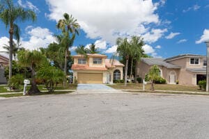 mediterranean / spanish-style home featuring a garage