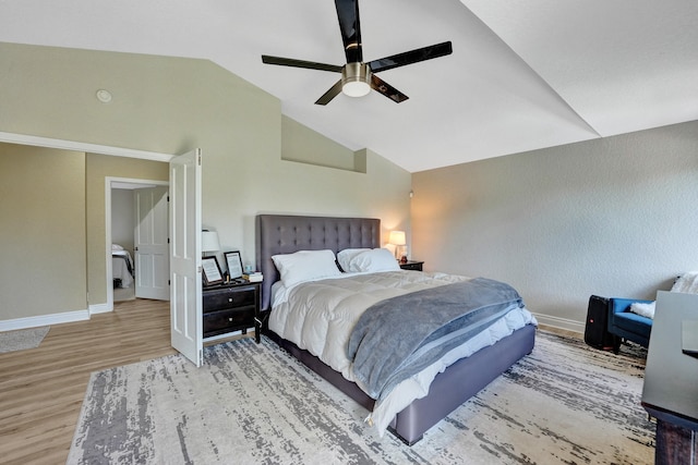 bedroom with lofted ceiling, ceiling fan, and light hardwood / wood-style floors