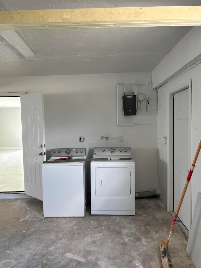 laundry area featuring independent washer and dryer