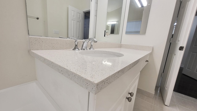 bathroom featuring vanity and tile patterned floors