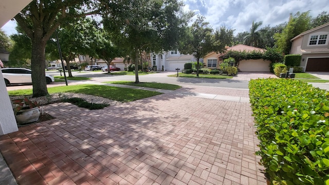 view of community with a garage