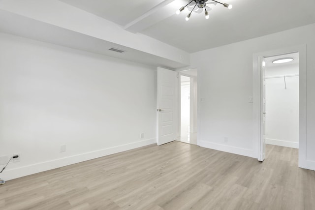 empty room with light wood-type flooring