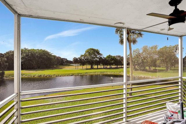 exterior space featuring a water view and ceiling fan