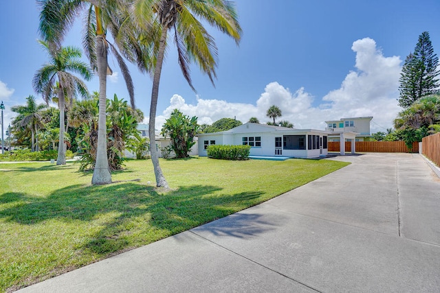 view of front of home featuring a front lawn