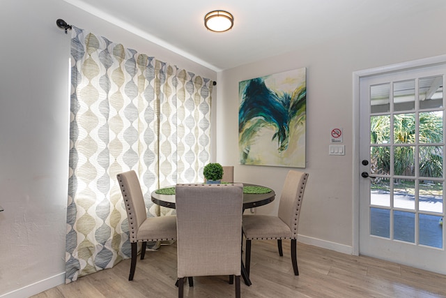 dining room featuring light hardwood / wood-style floors