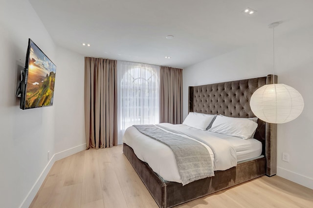 bedroom featuring light hardwood / wood-style flooring