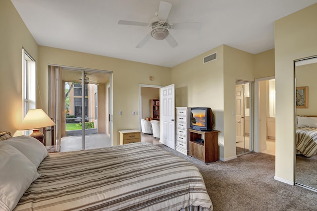 bedroom with access to exterior, ceiling fan, and carpet floors