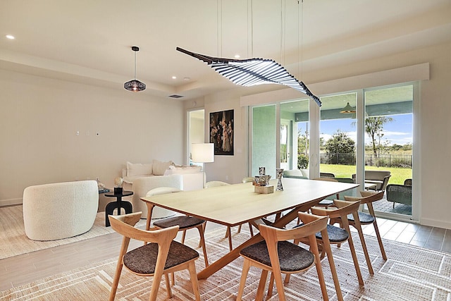 dining space featuring light hardwood / wood-style floors