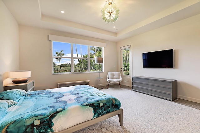 bedroom with a raised ceiling