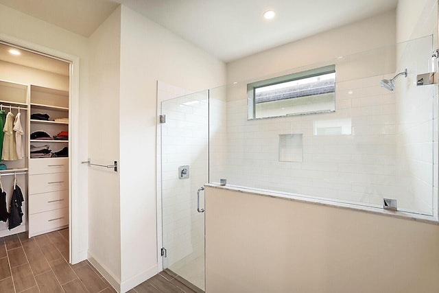 bathroom featuring an enclosed shower