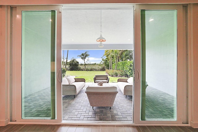 doorway featuring hardwood / wood-style floors