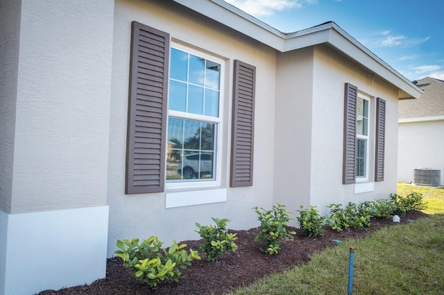 view of property exterior featuring central AC