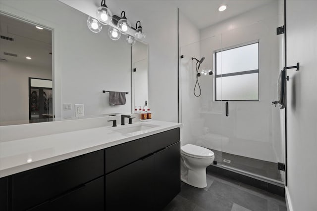 bathroom featuring walk in shower, toilet, and vanity