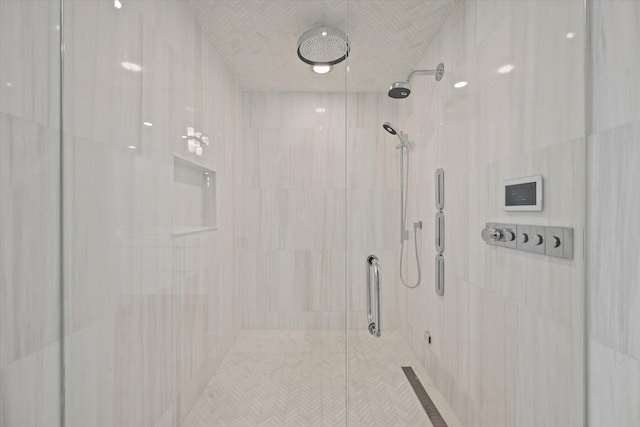 bathroom featuring an enclosed shower