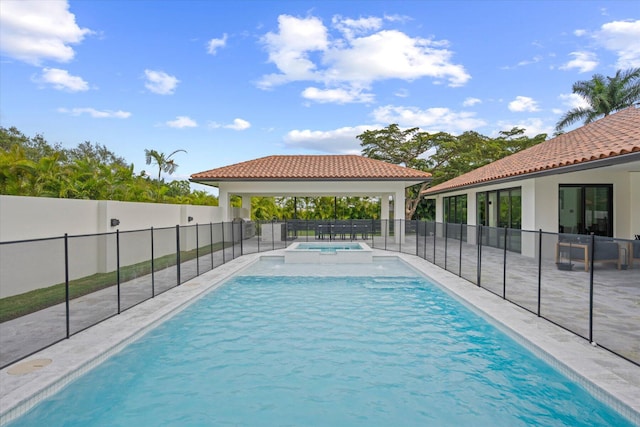 view of swimming pool featuring a gazebo and a patio