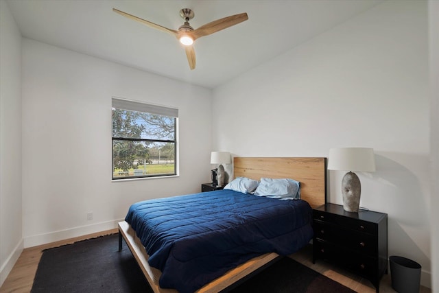 bedroom featuring hardwood / wood-style flooring and ceiling fan