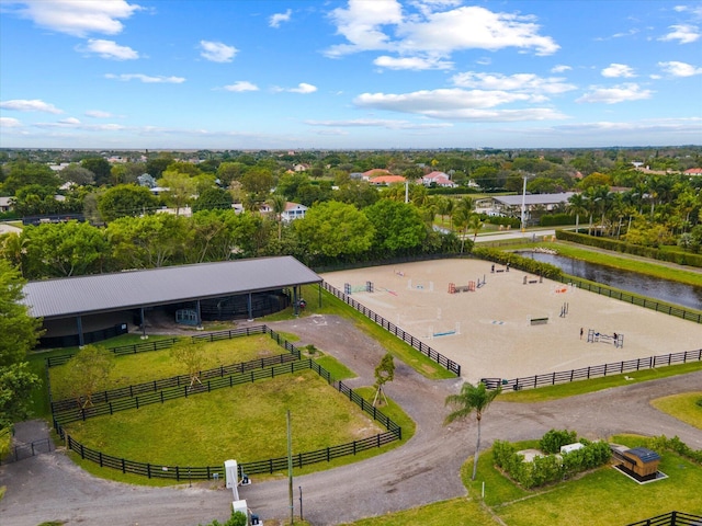 bird's eye view featuring a water view and a rural view