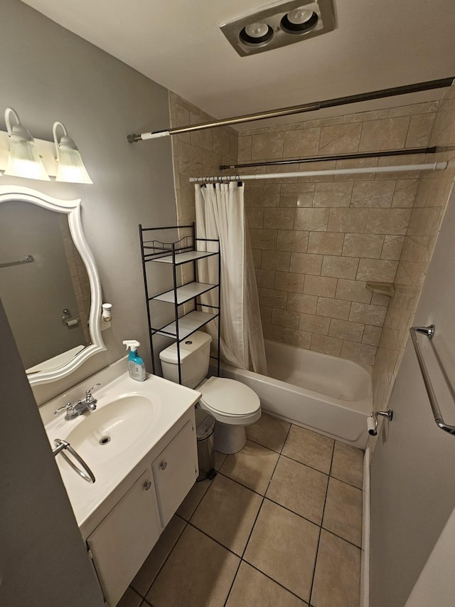 full bathroom featuring vanity, toilet, shower / bath combination with curtain, and tile patterned floors